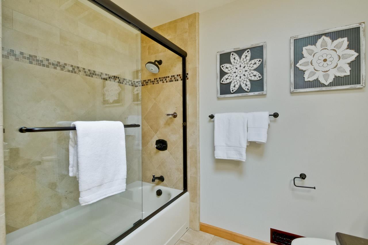 11131 Bubb Road Cupertino, CA 95014 - Photo 40 of 56 a bathroom with a tub and shower