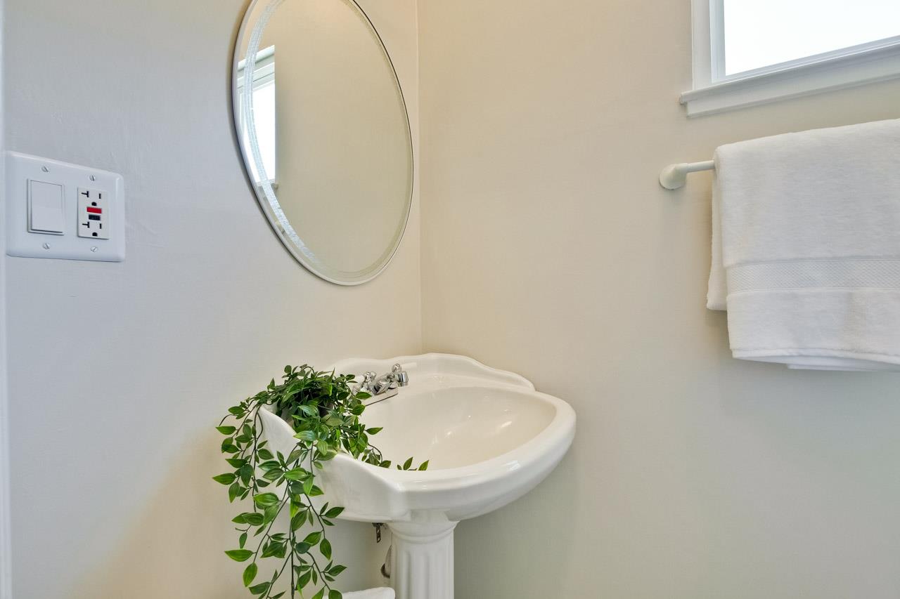 11131 Bubb Road Cupertino, CA 95014 - Photo 42 of 56 a bathroom with a sink and a mirror