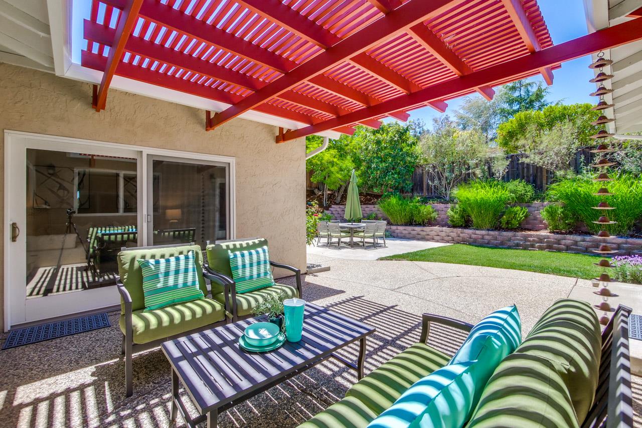 11131 Bubb Road Cupertino, CA 95014 - Photo 50 of 56 a view of a patio with couches chairs and a table and chairs