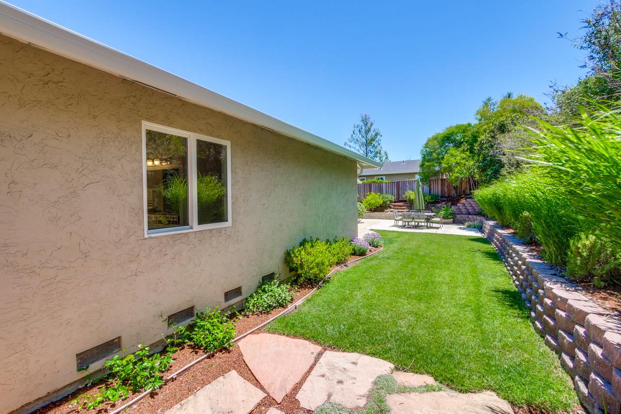 11131 Bubb Road Cupertino, CA 95014 - Photo 56 of 56 a front view of a house with a yard