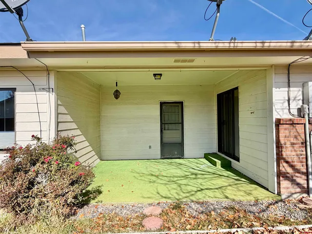a view of a pool with an outdoor space