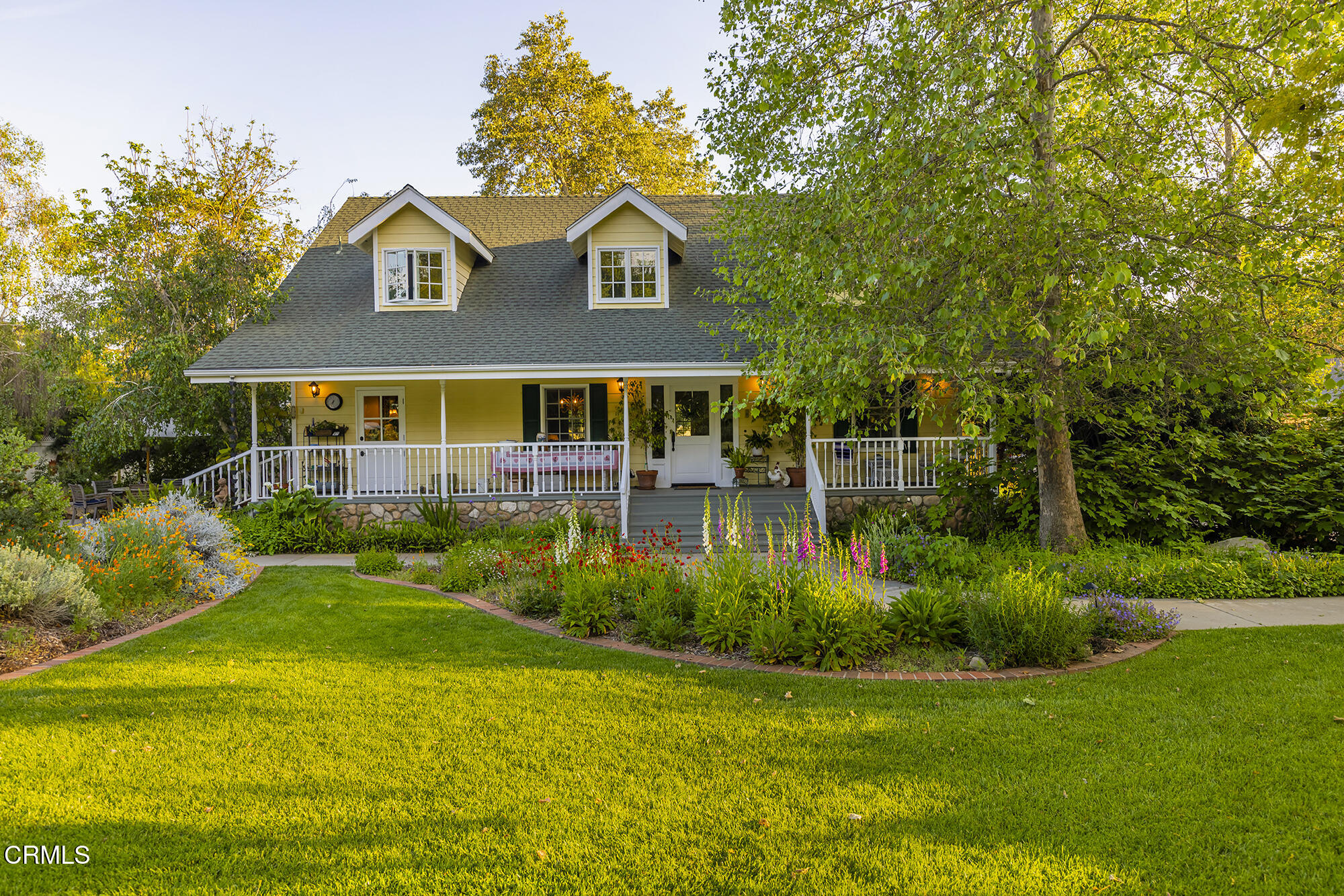 924 Fairview Road Ojai, CA 93023 - Photo 1 of 22 a front view of a house with garden
