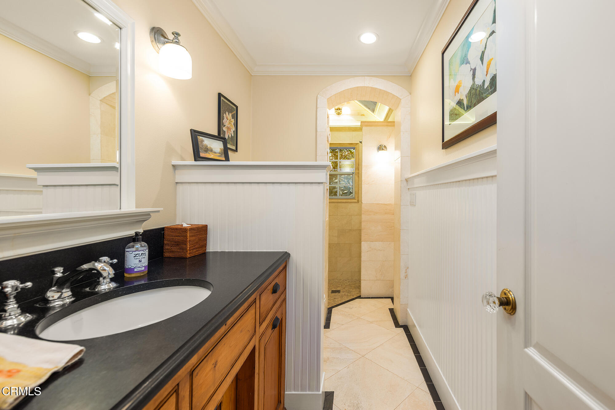 924 Fairview Road Ojai, CA 93023 - Photo 15 of 22 a bathroom with a sink a vanity and a mirror