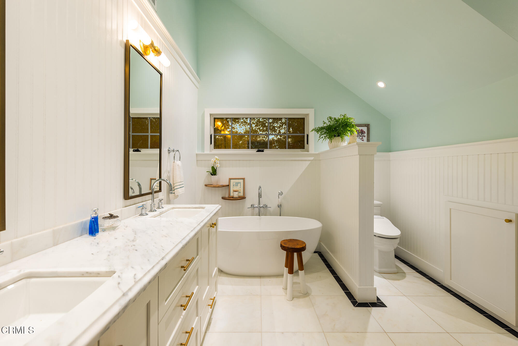 924 Fairview Road Ojai, CA 93023 - Photo 18 of 22 a spacious bathroom with a granite countertop sink a toilet and bathtub