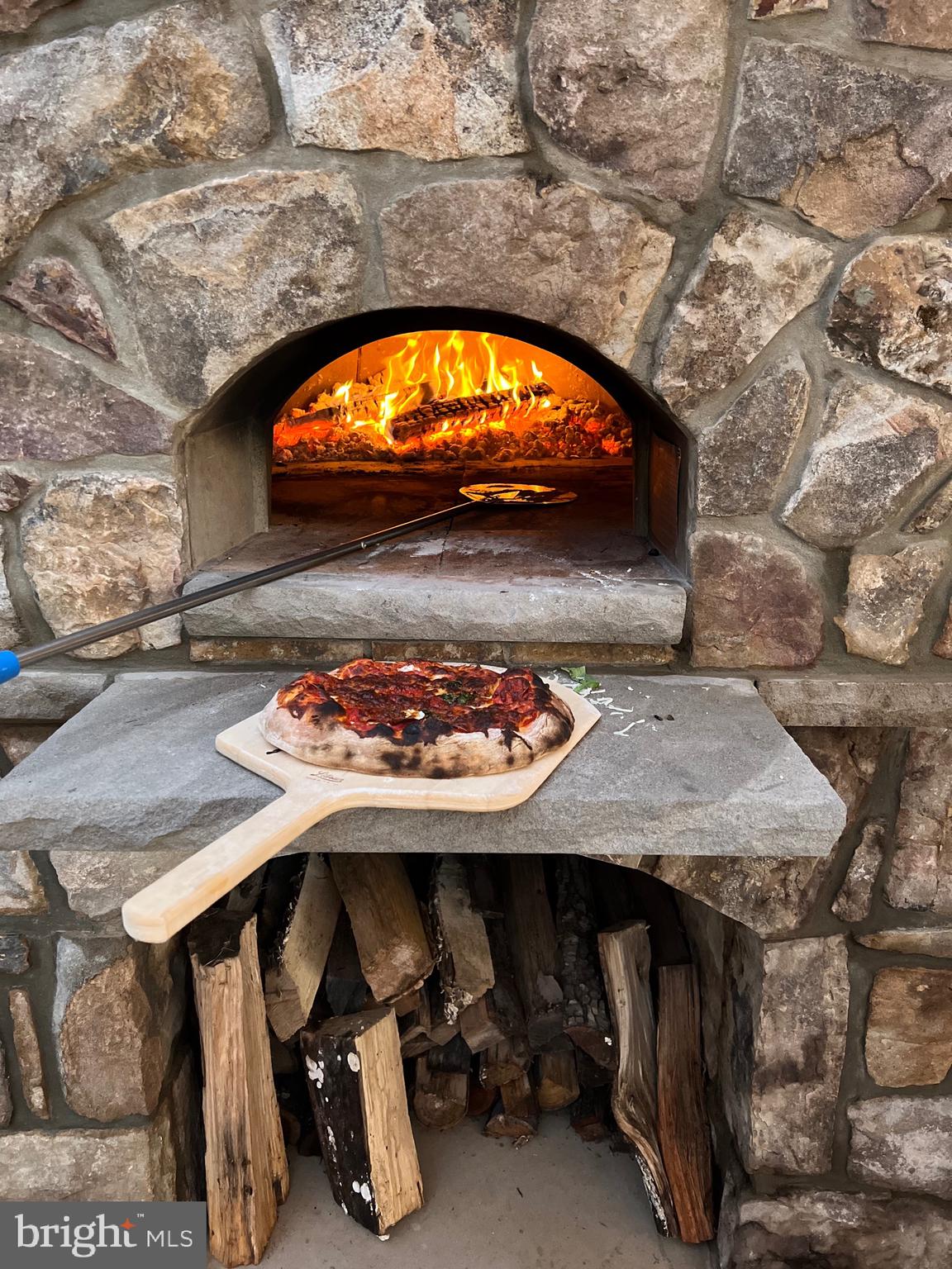 7484 Wilson Road Warrenton, VA 20186 - Photo 15 of 81 a view of a swimming pool with outdoor seating