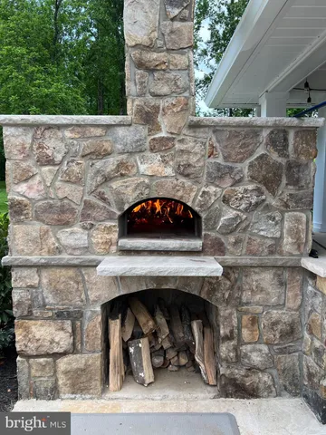 a kitchen with a stove and a cabinet