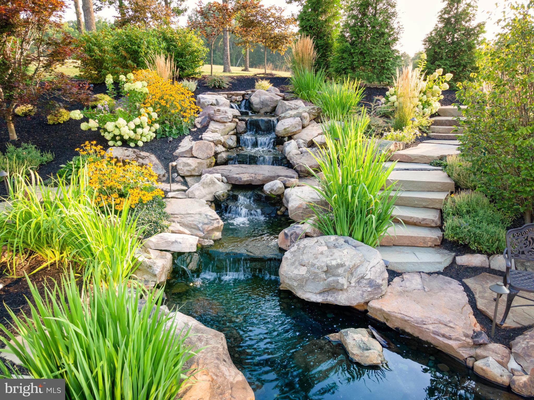 7484 Wilson Road Warrenton, VA 20186 - Photo 20 of 81 a view of a garden with chairs
