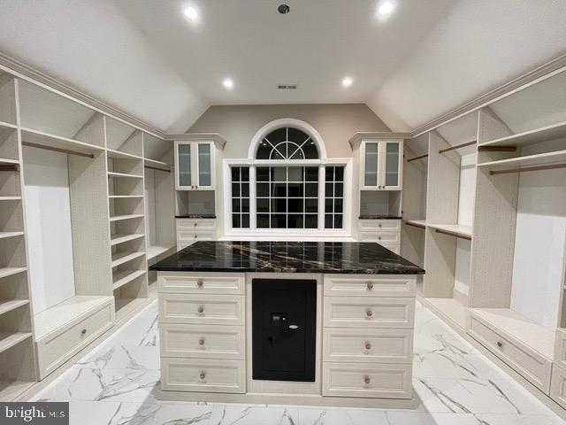 7484 Wilson Road Warrenton, VA 20186 - Photo 26 of 81 a kitchen with a stove and a cabinet
