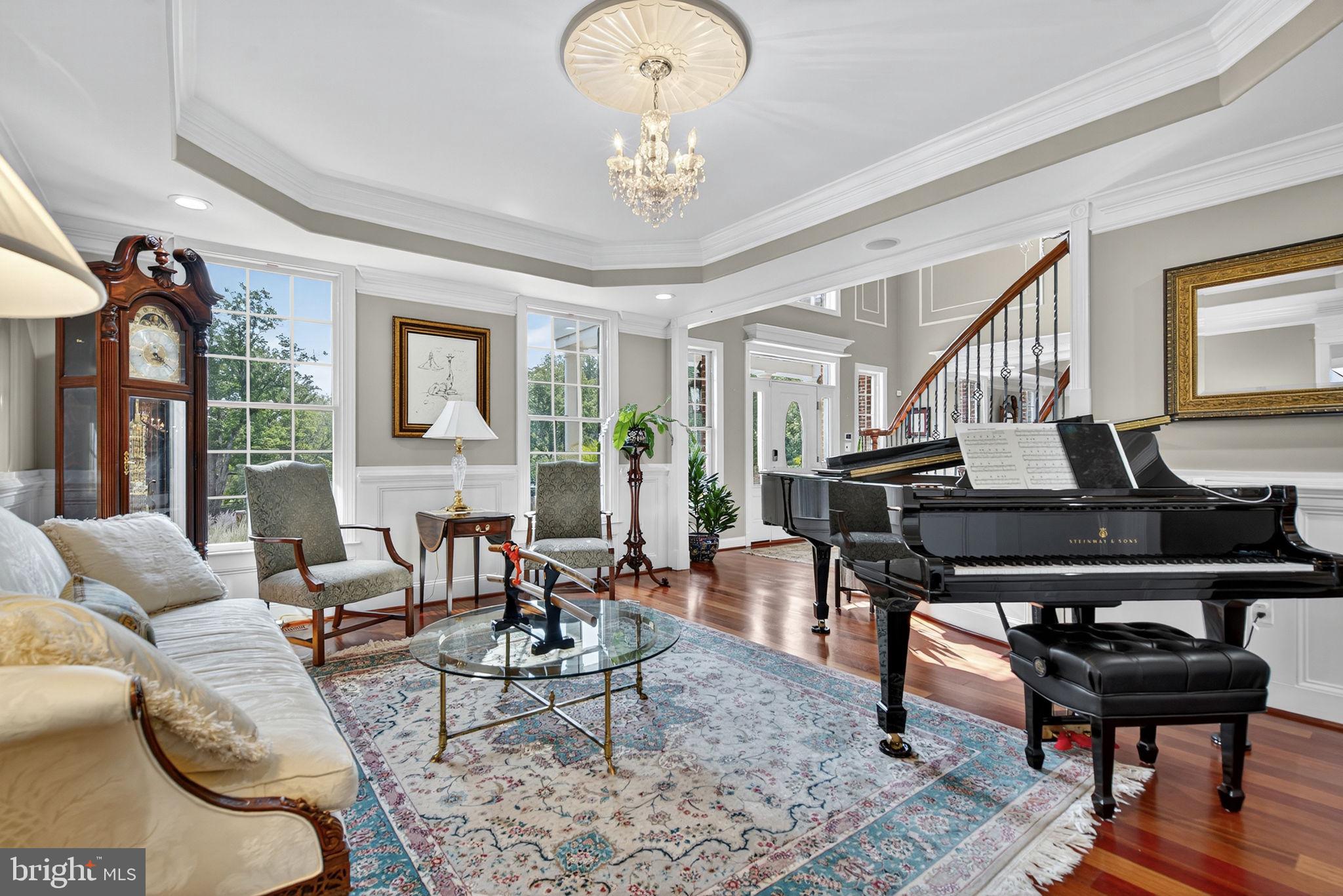 7484 Wilson Road Warrenton, VA 20186 - Photo 32 of 81 a living room with furniture and wooden floor