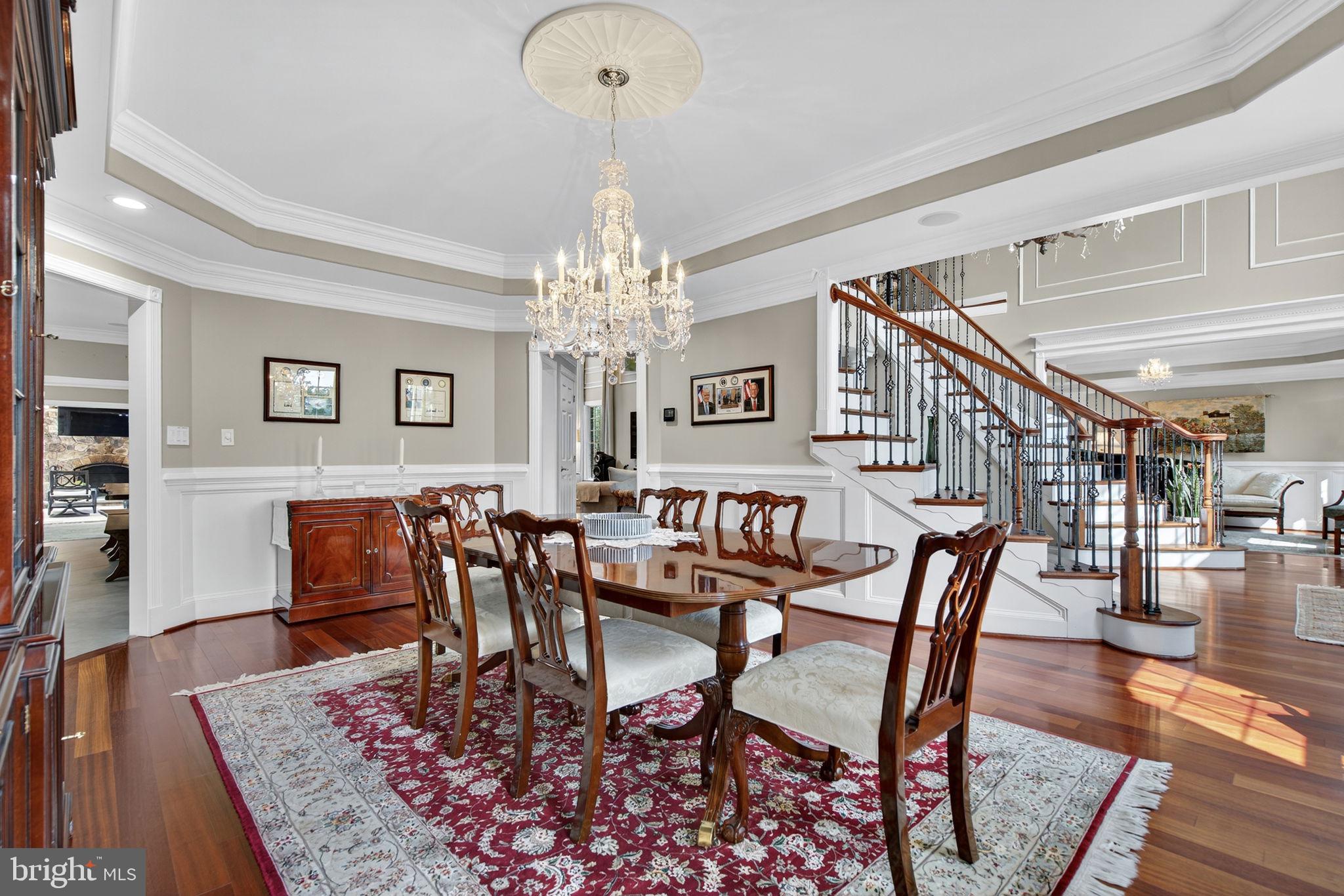 7484 Wilson Road Warrenton, VA 20186 - Photo 34 of 81 a view of a dining room with furniture and wooden floor