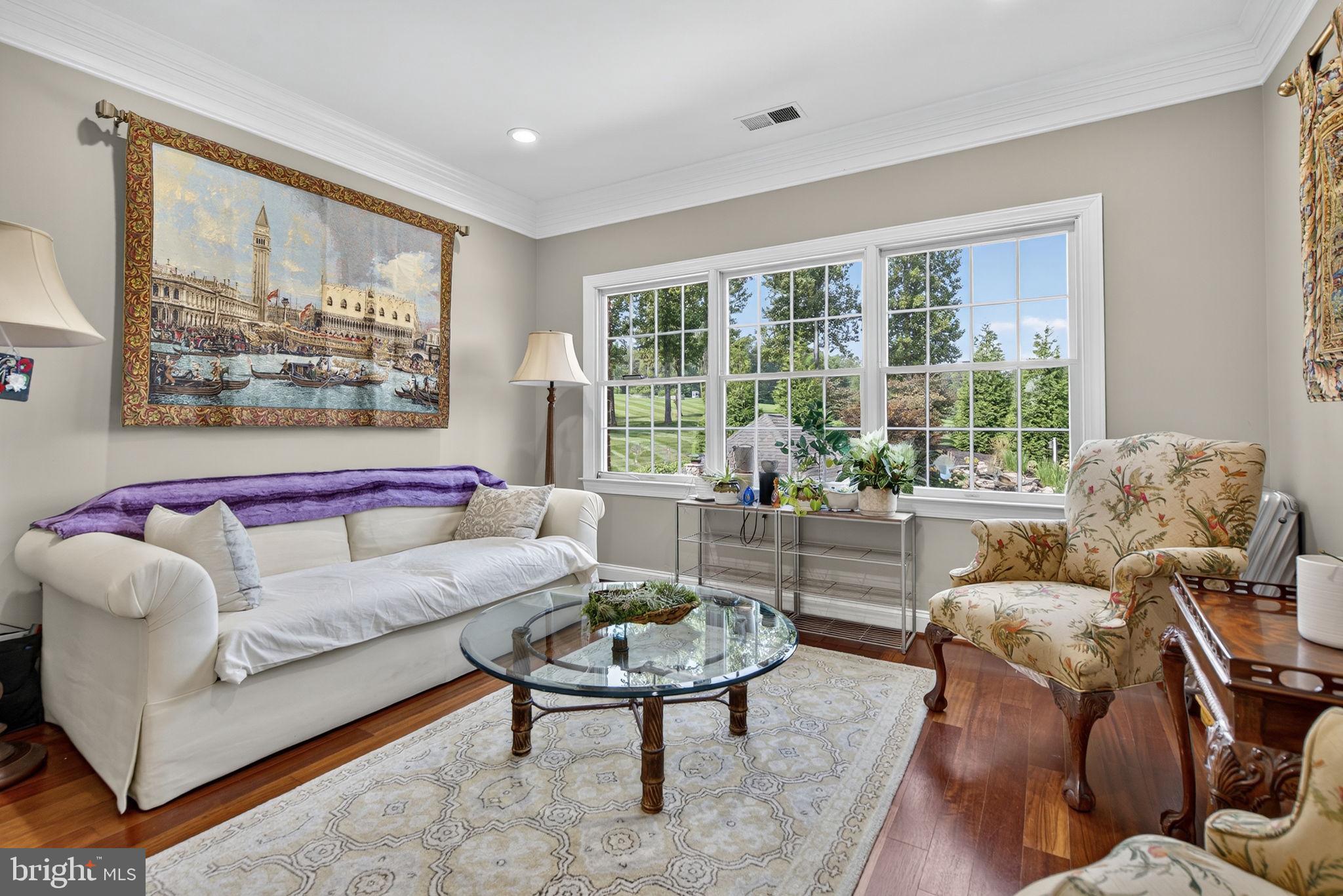 7484 Wilson Road Warrenton, VA 20186 - Photo 56 of 81 a living room with furniture and a large window
