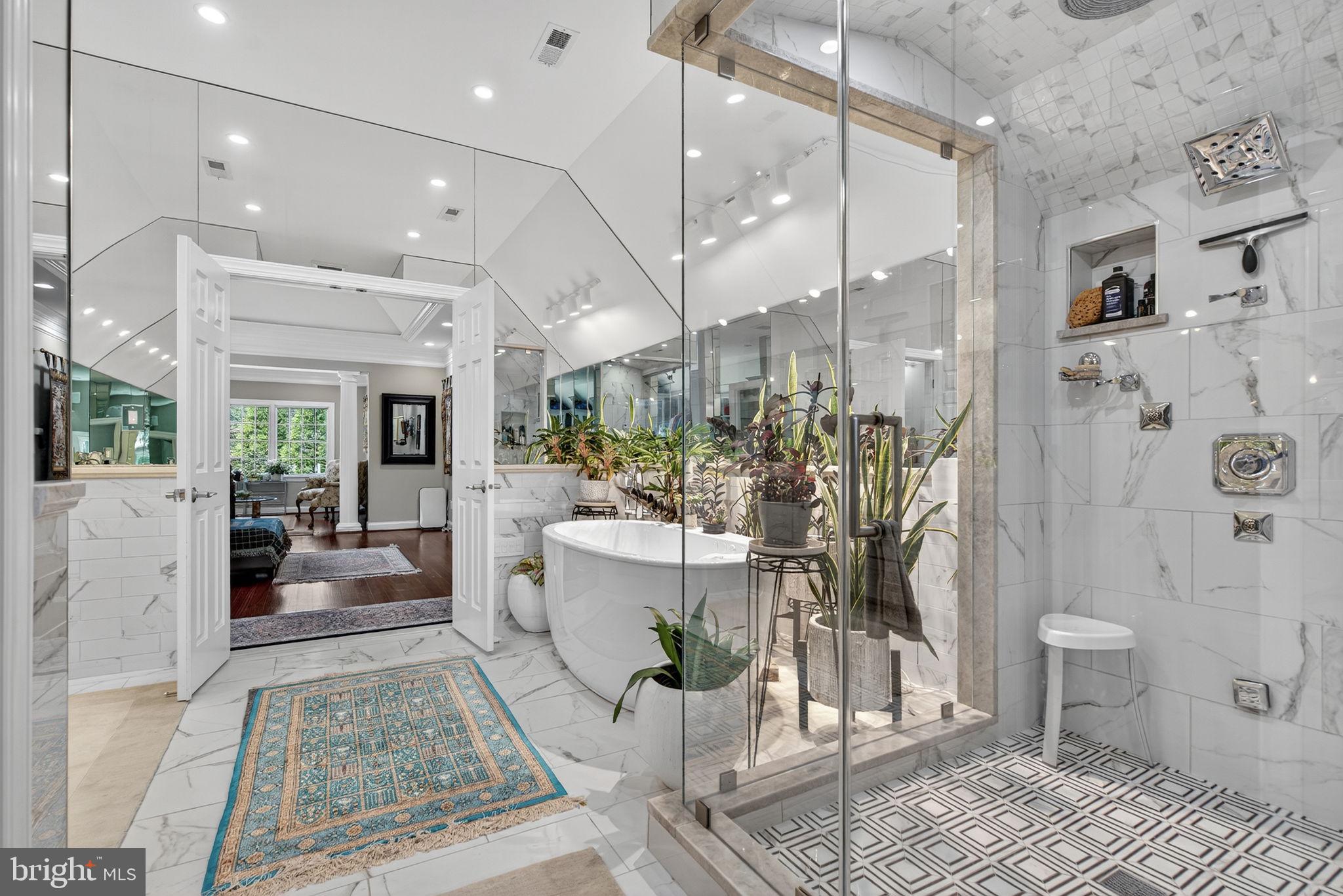 7484 Wilson Road Warrenton, VA 20186 - Photo 59 of 81 a living room with furniture a rug and a chandelier