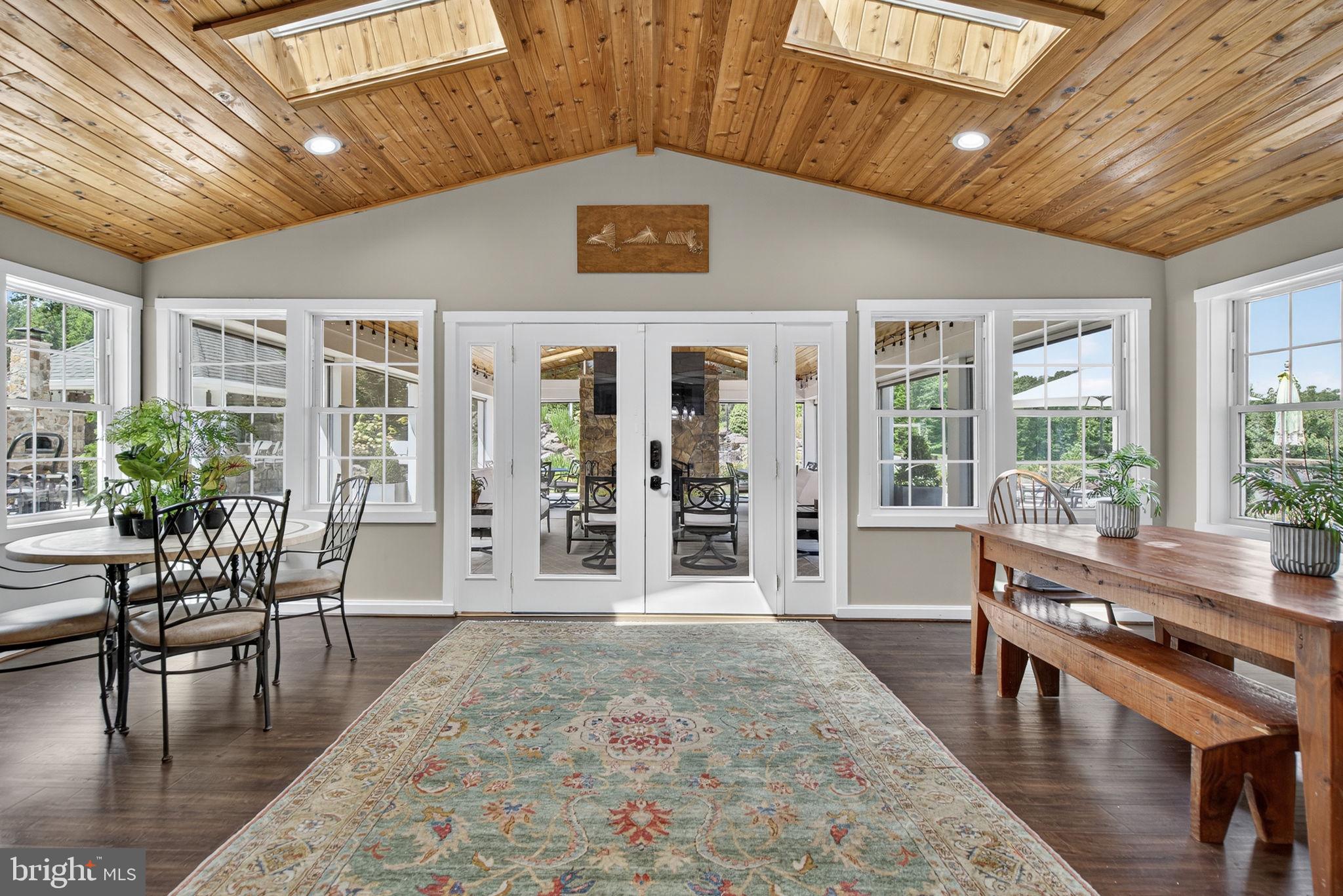 7484 Wilson Road Warrenton, VA 20186 - Photo 67 of 81 a view of a livingroom with furniture window and wooden floor