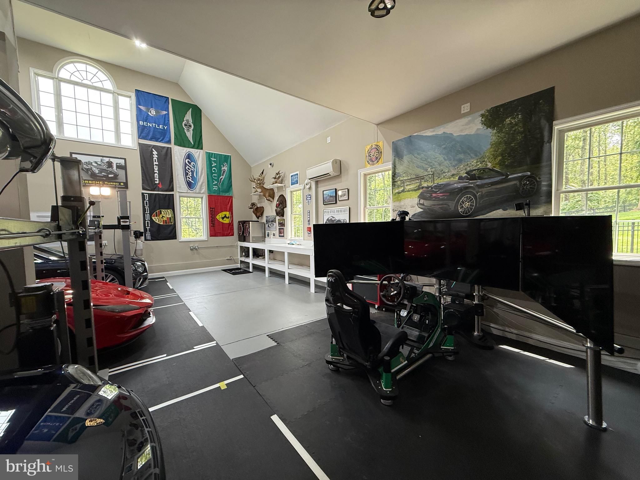 7484 Wilson Road Warrenton, VA 20186 - Photo 80 of 81 a living room with furniture gym equipment and a fireplace