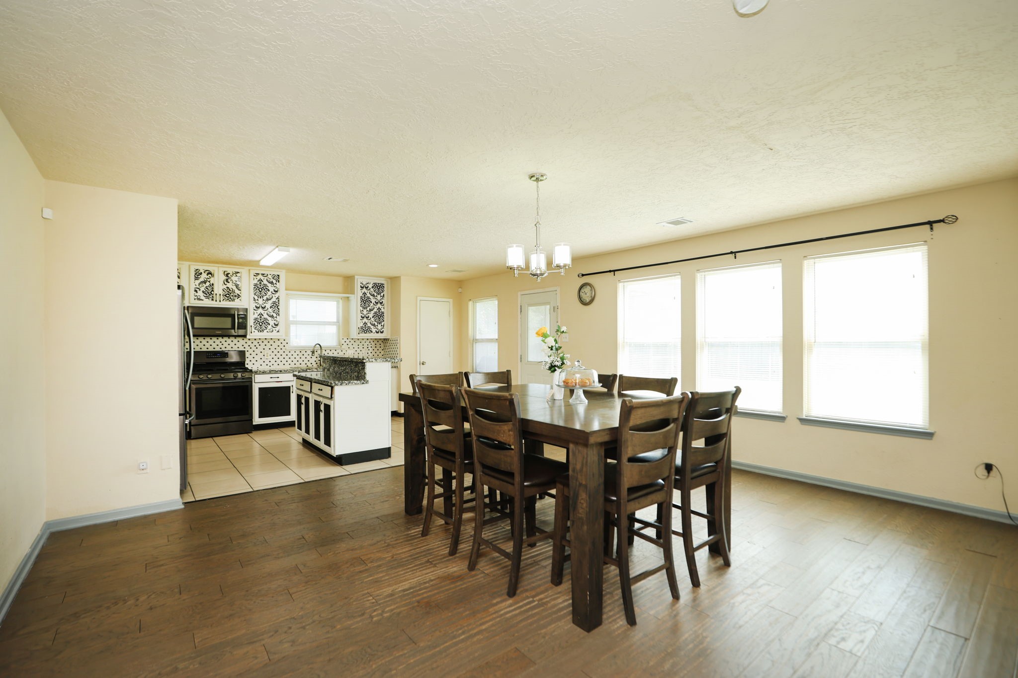 11642 Quinn Ridge Way Houston, TX 77038 - Photo 8 of 22 Another view of the dining area and kitchen from the family room