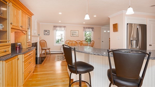 32 Columbus Road Marshfield, MA 02050 - Photo 18 of 37 a living room with furniture and a large window