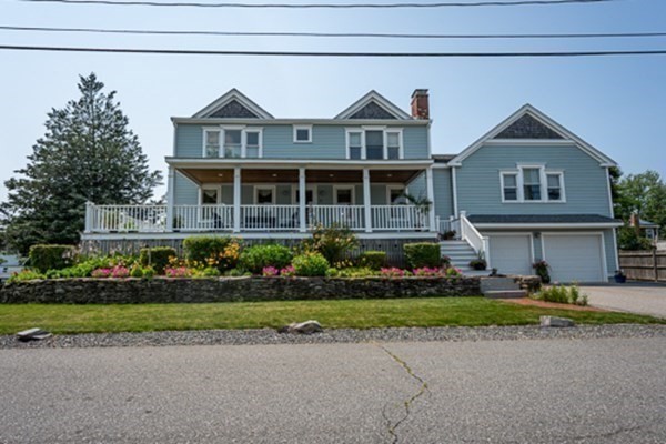 32 Columbus Road Marshfield, MA 02050 - Photo 2 of 37 a front view of a house with a yard