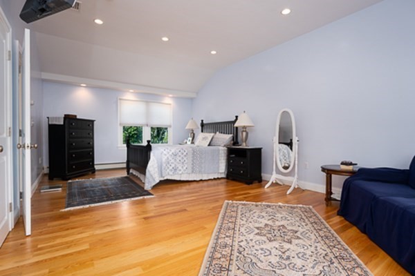 32 Columbus Road Marshfield, MA 02050 - Photo 25 of 37 a living room with furniture and a rug