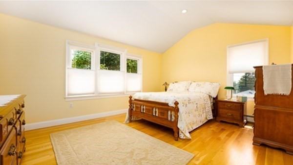 32 Columbus Road Marshfield, MA 02050 - Photo 27 of 37 a bedroom with a bed window and a night stand