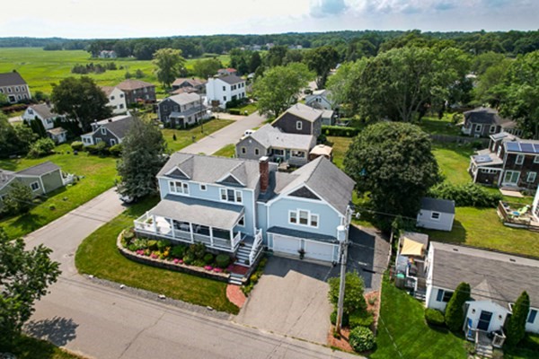 32 Columbus Road Marshfield, MA 02050 - Photo 3 of 37 an aerial view of a house with a garden