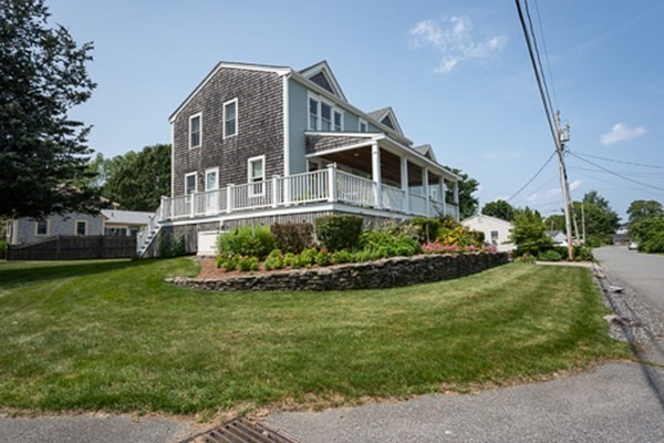 32 Columbus Road Marshfield, MA 02050 - Photo 31 of 37 a front view of house with yard and green space