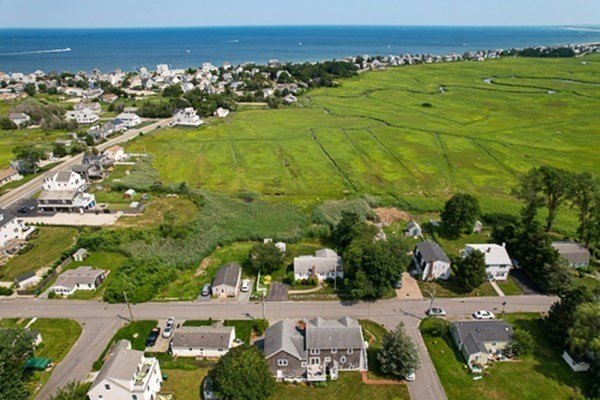 32 Columbus Road Marshfield, MA 02050 - Photo 6 of 37 an aerial view of a building with outdoor space