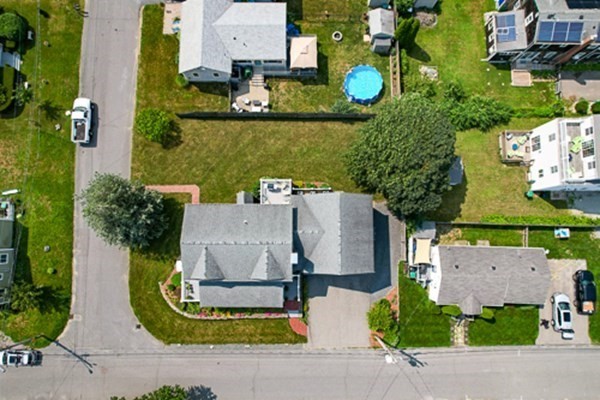 32 Columbus Road Marshfield, MA 02050 - Photo 8 of 37 an aerial view of a house with yard swimming pool and outdoor seating