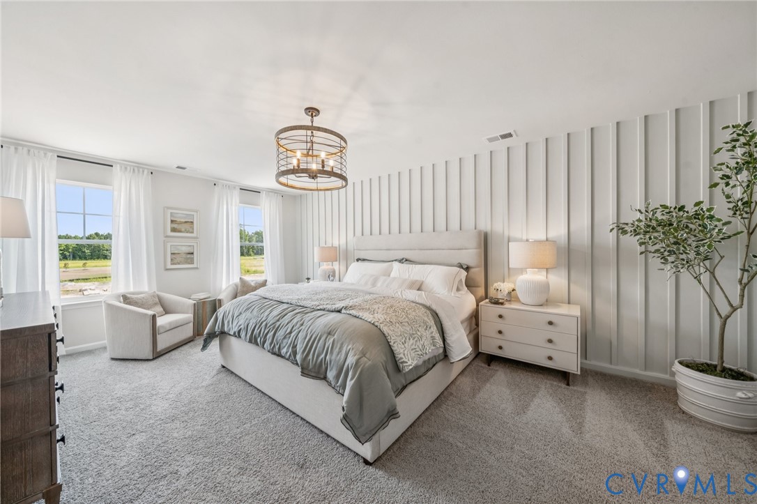 155 Liberty Lane Keswick, VA 22947 - Photo 15 of 32 a bed room with a bed and a large window