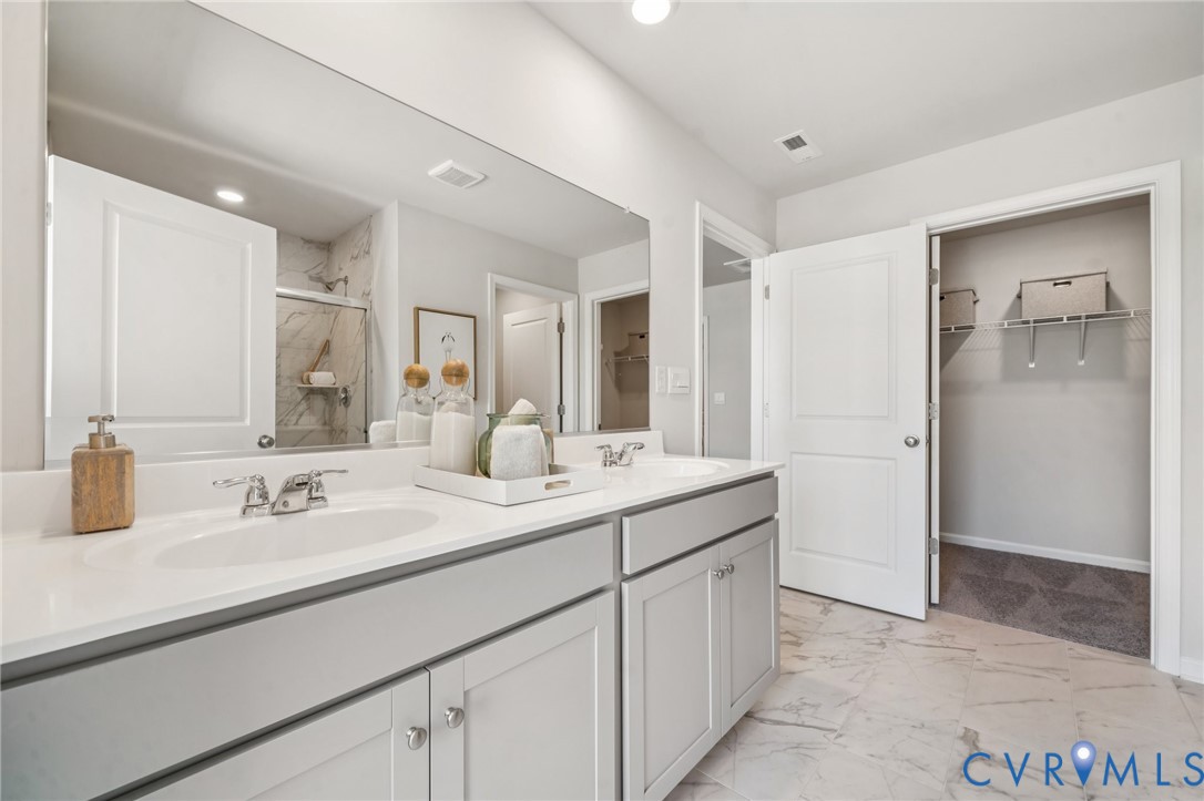 155 Liberty Lane Keswick, VA 22947 - Photo 20 of 32 a bathroom with a sink and a mirror