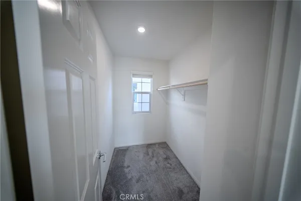 a view of small space with wooden floor