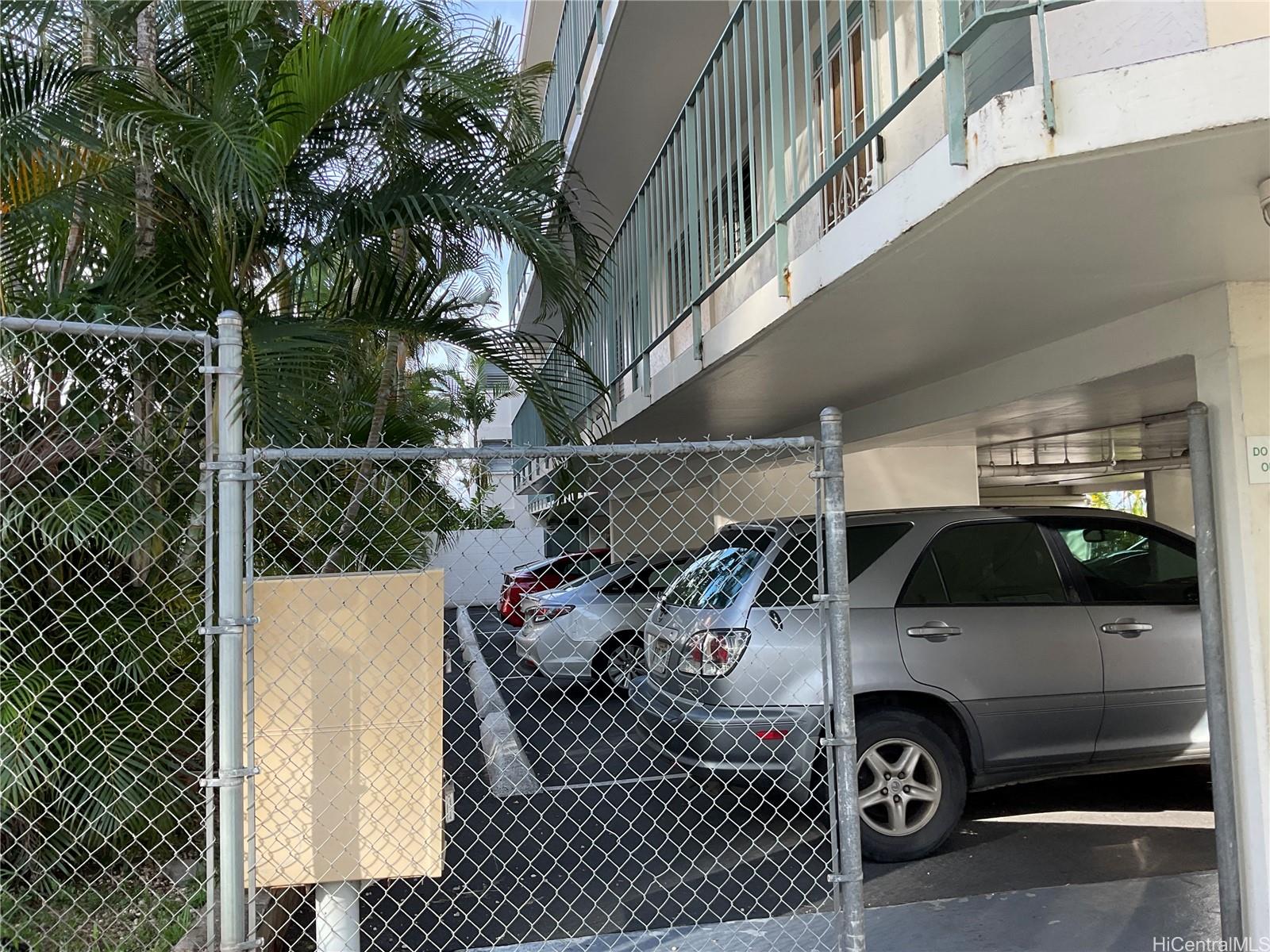 1019 Maunaihi Place, Unit 203 Honolulu, HI 96822 - Photo 14 of 19 a view of a garage