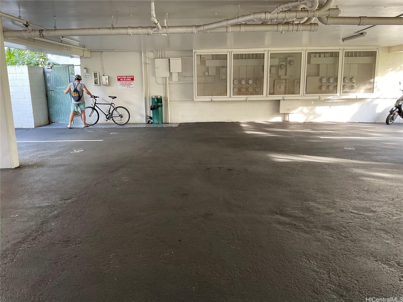 1019 Maunaihi Place, Unit 203 Honolulu, HI 96822 - Photo 16 of 19 a view of a garage