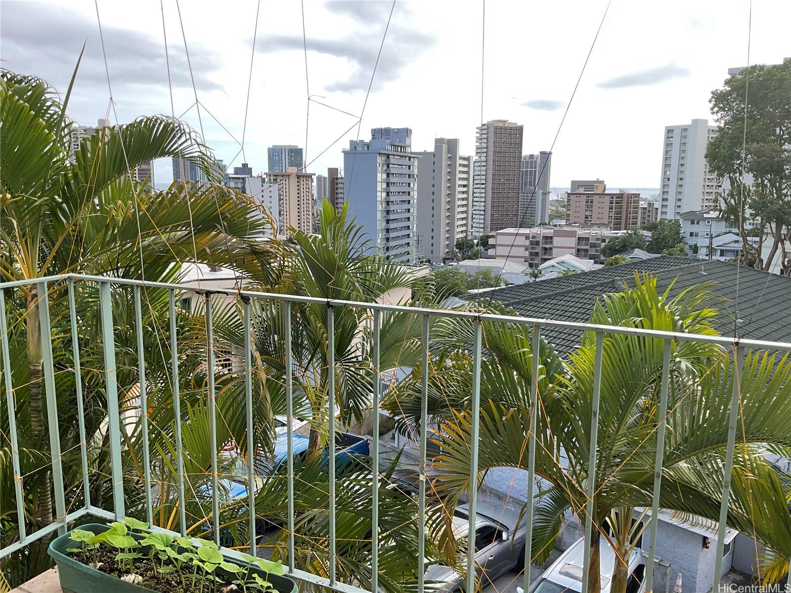1019 Maunaihi Place, Unit 203 Honolulu, HI 96822 - Photo 2 of 19 a view of a city and tall buildings