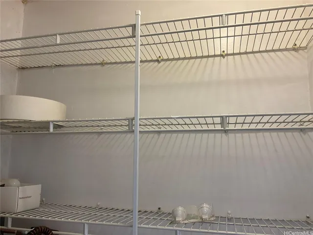 a bathroom with a shower and a toilet