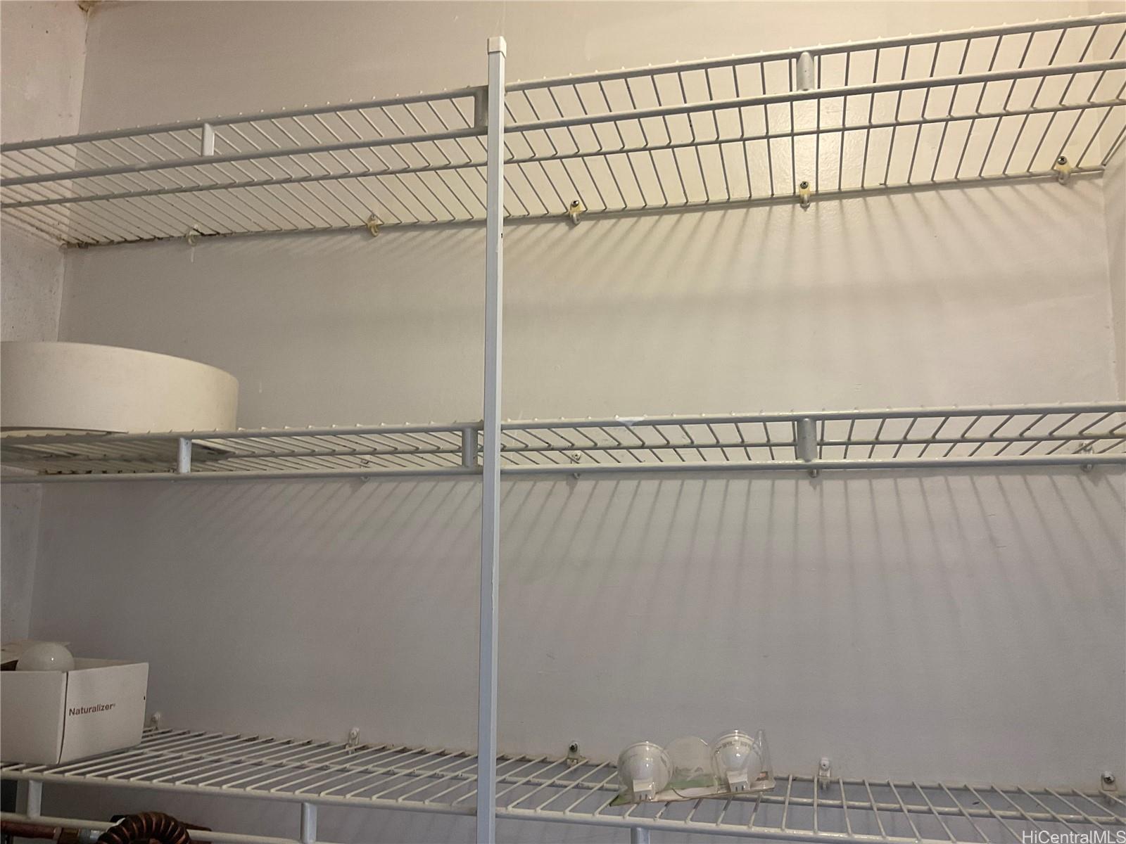 1019 Maunaihi Place, Unit 203 Honolulu, HI 96822 - Photo 9 of 19 a bathroom with a shower and a toilet