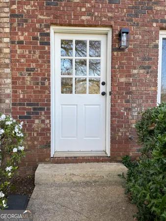 a house with trees in front of it