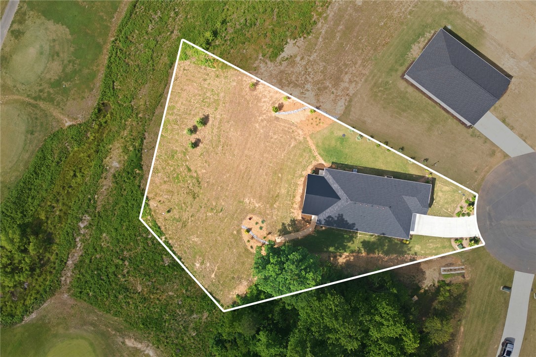 412 Chadwick Lane Walhalla, SC 29691 - Photo 30 of 37 An aerial view captures the property's distinct lot shape and well-maintained grounds.