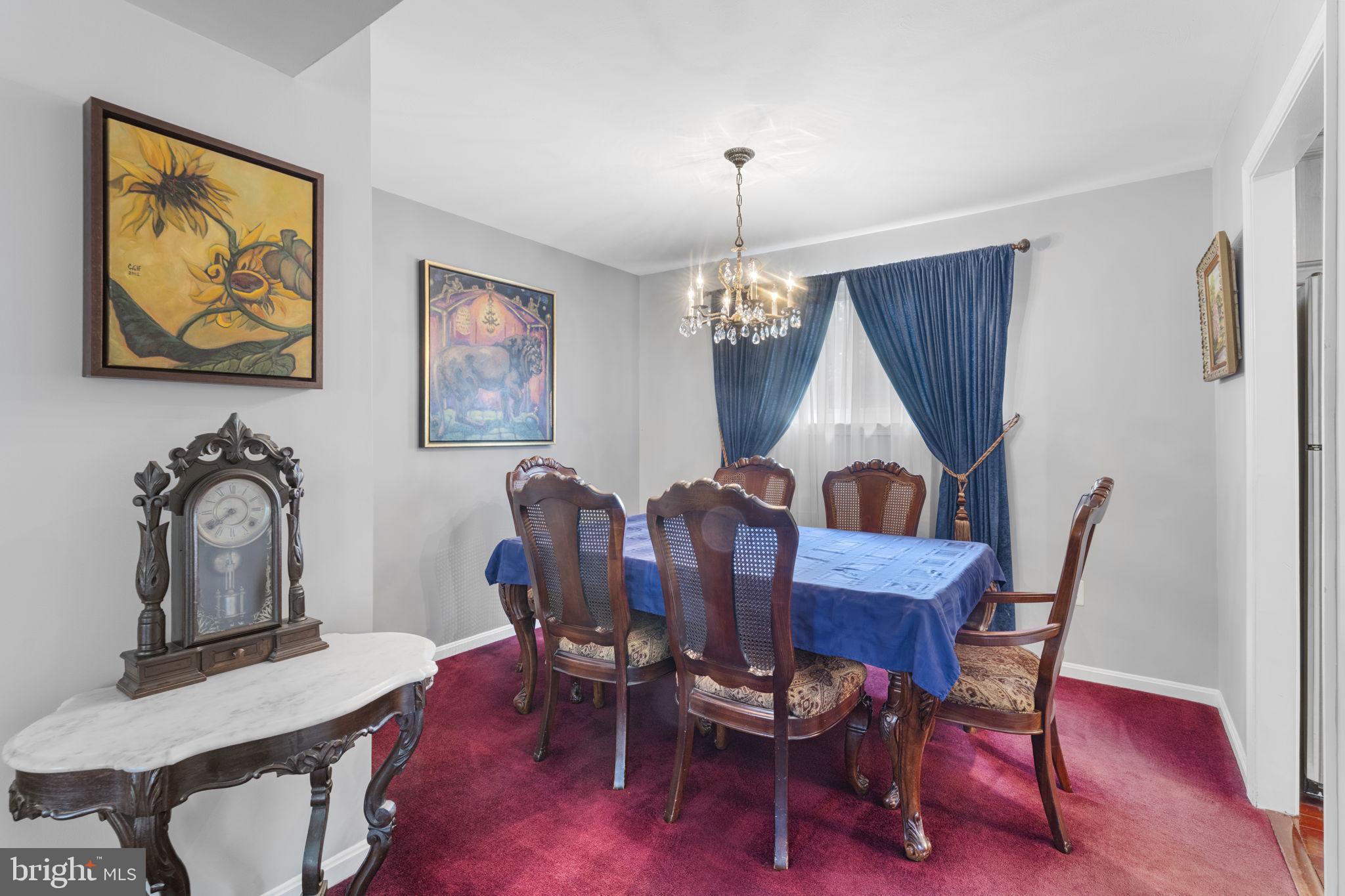 9801 Pulham Road Burke, VA 22015 - Photo 20 of 63 a view of a dining room with furniture window and wooden floor