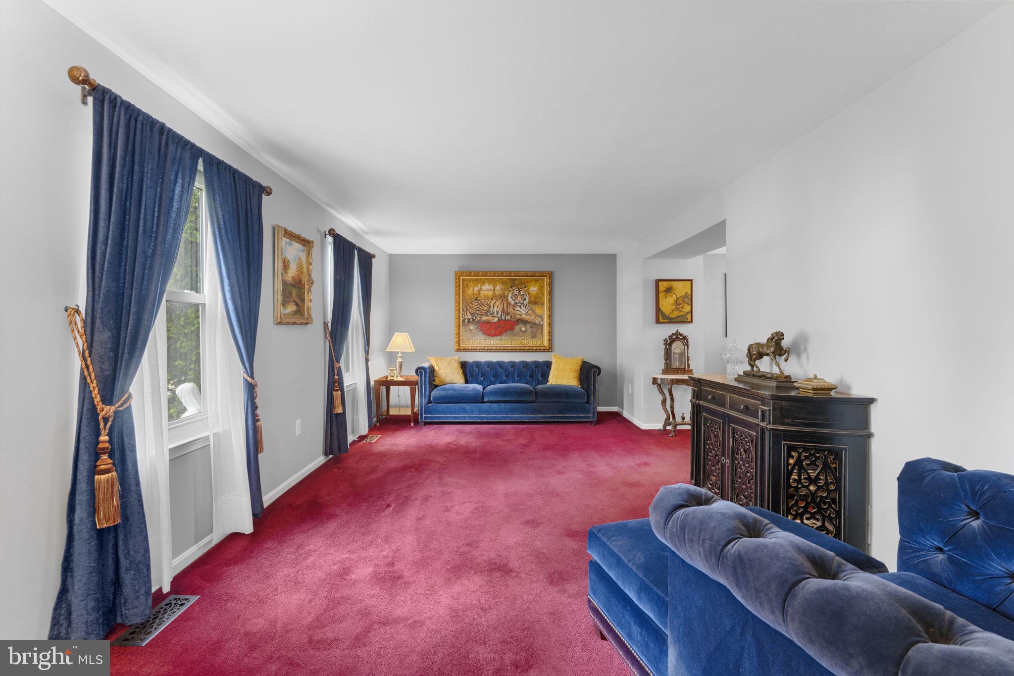 9801 Pulham Road Burke, VA 22015 - Photo 22 of 63 a bed room with furniture and a flat screen tv