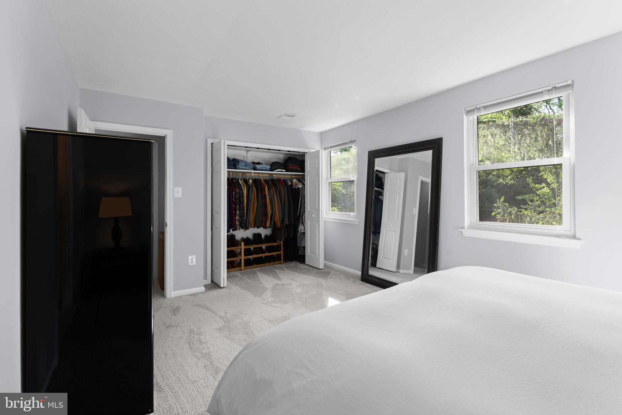 9801 Pulham Road Burke, VA 22015 - Photo 25 of 63 a bed room with a bed and a window