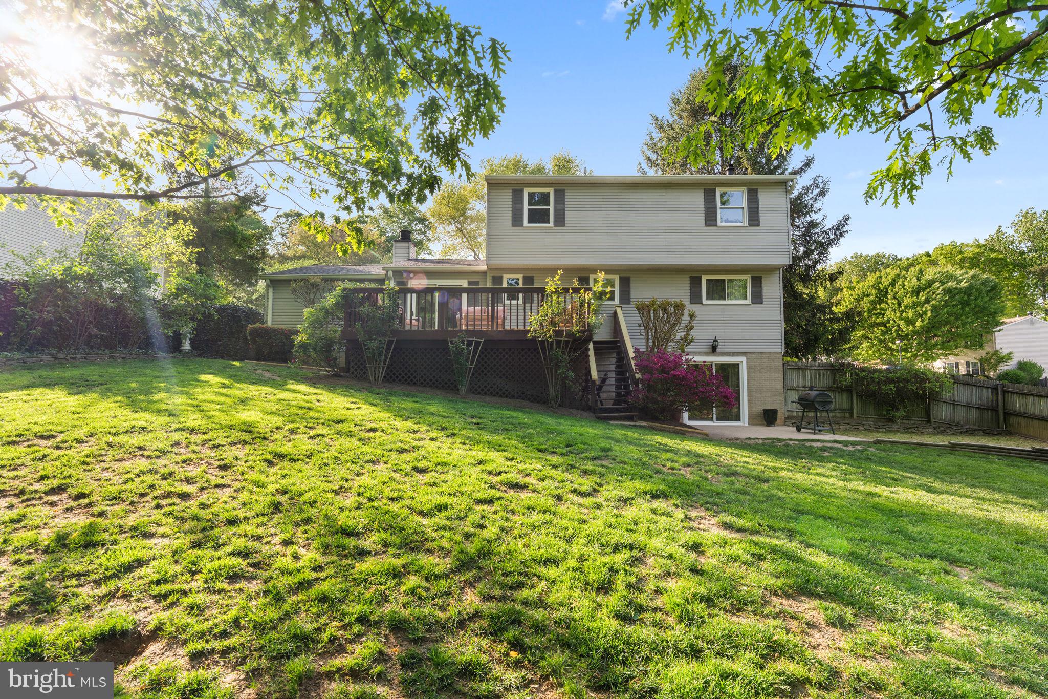 9801 Pulham Road Burke, VA 22015 - Photo 40 of 63 a house view with swimming pool in front of it
