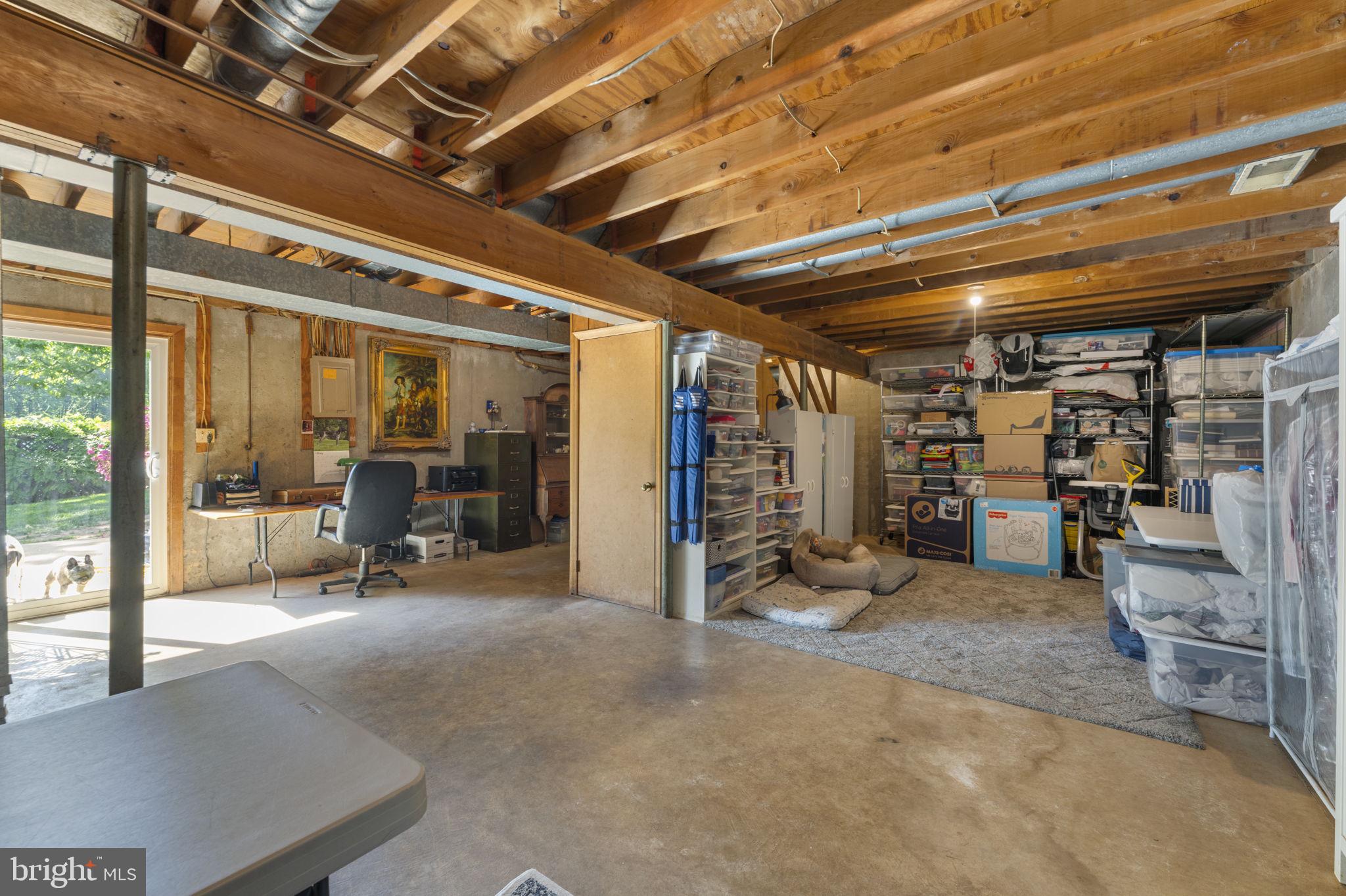 9801 Pulham Road Burke, VA 22015 - Photo 50 of 63 a view of a room with air conditioner duct and materials on floor
