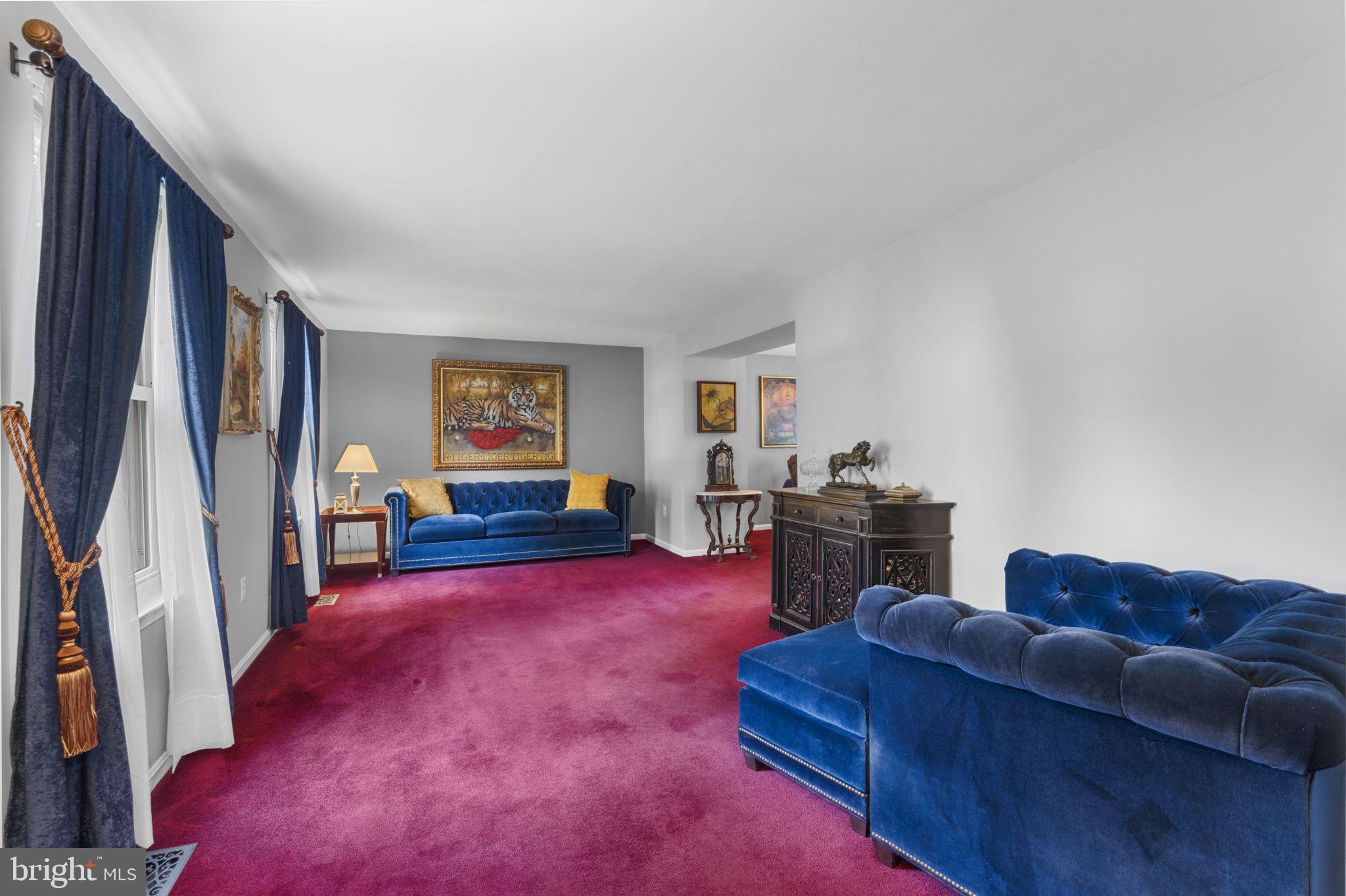 9801 Pulham Road Burke, VA 22015 - Photo 7 of 63 a living room with furniture and a flat screen tv