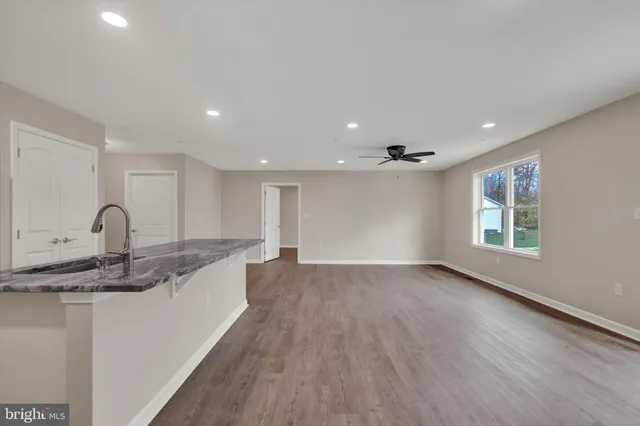 a view of a kitchen with sink and dishwasher