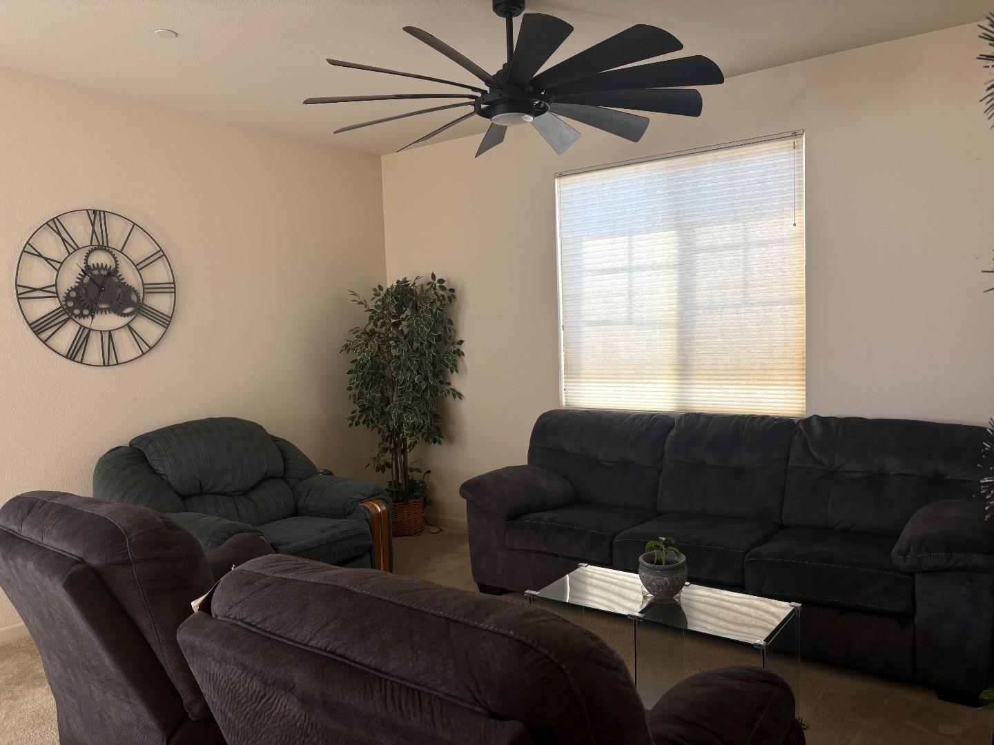 51 Sturla Way Gilroy, CA 95020 - Photo 11 of 27 a living room with furniture and a window