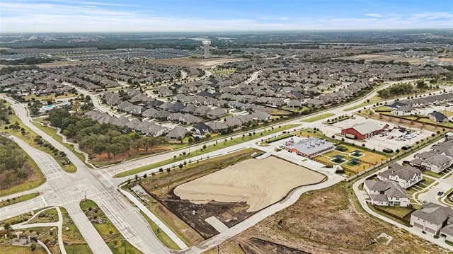 an aerial view of a residential building