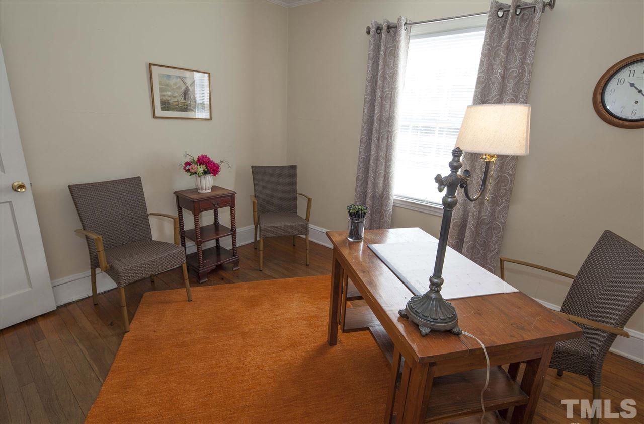 2609 Kittrell Drive Raleigh, NC 27608 - Photo 17 of 25 a view of a dining room with furniture and a window