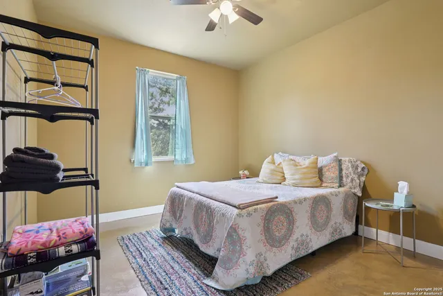 a view of a park with swings and slides