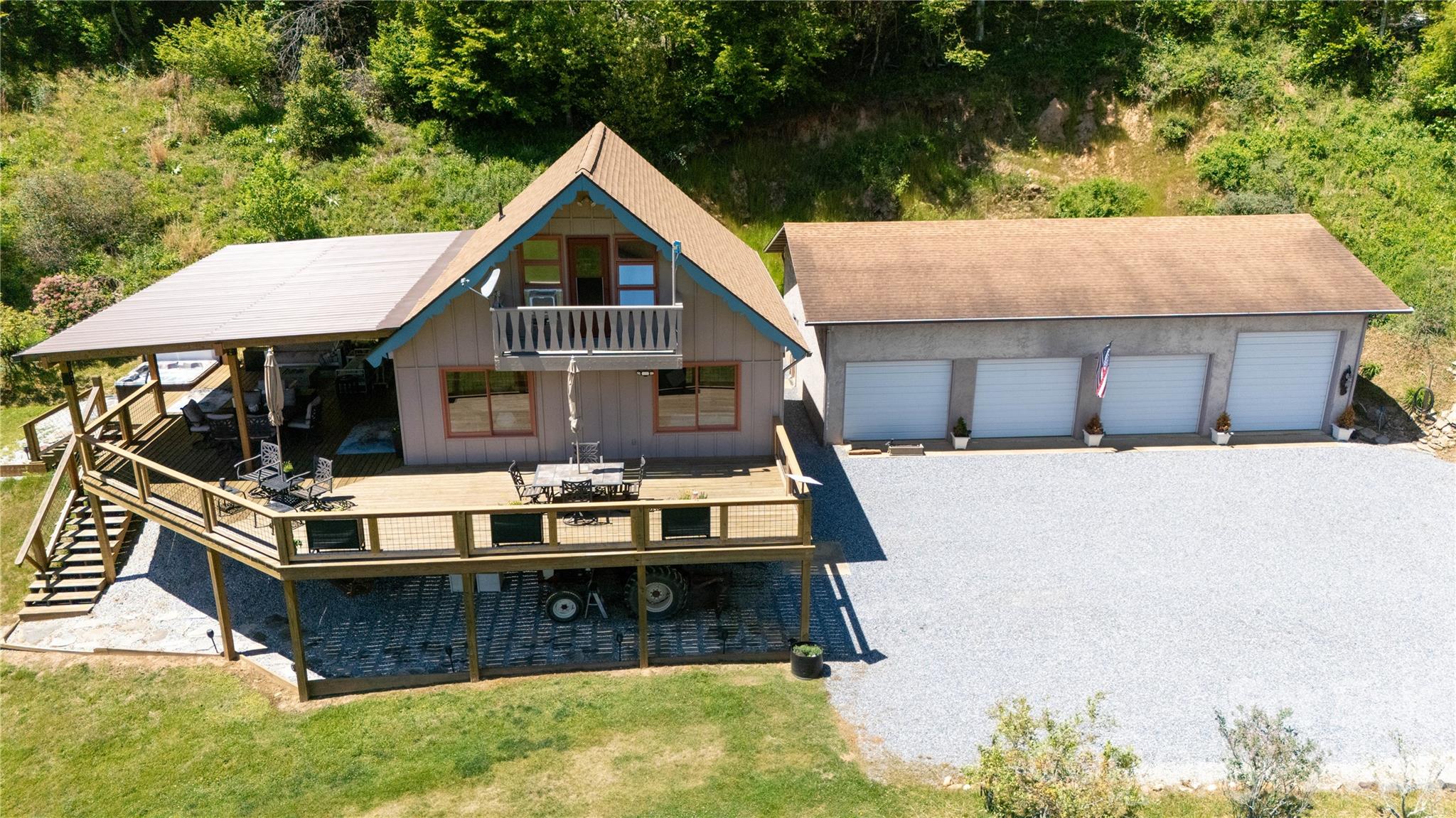 93 Franklin Crest Road Spruce Pine, NC 28777 - Photo 5 of 47 a view of a house with pool and chairs