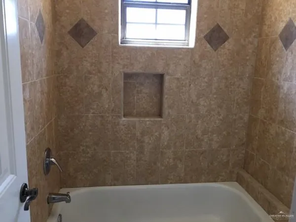 a bathroom with a bathtub